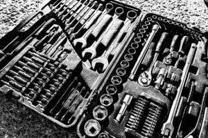 Socket wrenches and tools in a case